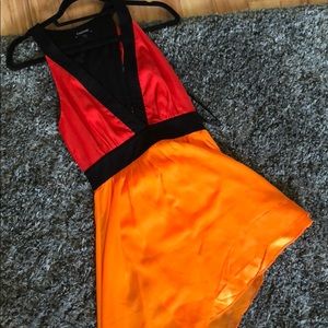Asymmetrical bold color/cut dress